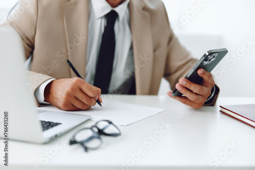 Man document corporate plan pen table businessman business hands suit write desk