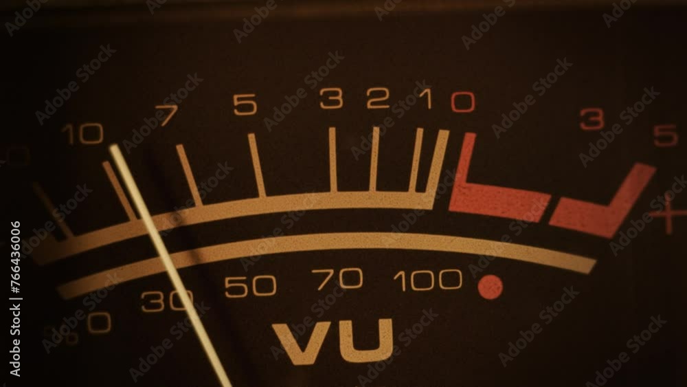 VU meter. Macro shot of a studio volume meter. Symbol of music production, recording and live show broadcasting. A pro equipment video loop, with natural colors. Ideal also for intros or logos
