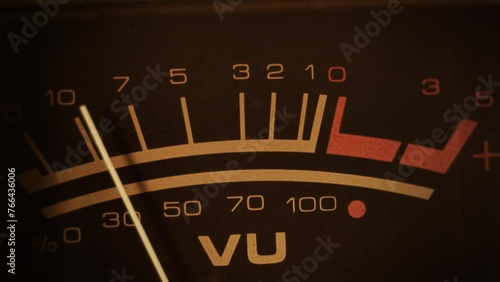 VU meter. Macro shot of a studio volume meter. Symbol of music production, recording and live show broadcasting. A pro equipment video loop, with natural colors. Ideal also for intros or logos photo