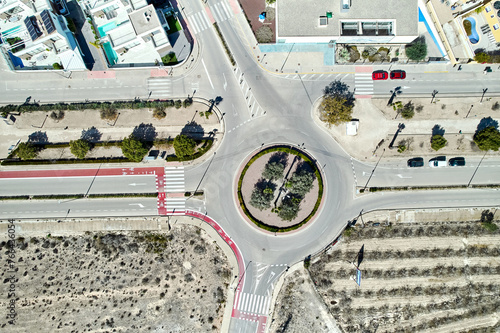 Aerial photography, view from above of empty roads intersection, streets view of Los Montesinos suburban district. Province of Alicante. Costa Blanca. Spain