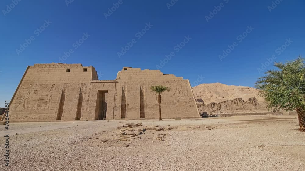 Temple of Medinet Habu. Egypt, Luxor. The Mortuary Temple of Ramesses III at Medinet Habu is an important New Kingdom period structure in the West Bank of Luxor in Egypt. Temple of Medinet Habu. Egypt, Luxor. The Mortuary Temple of Ramesses III at Medinet Habu is an important New Kingdom period structure in the West Bank of Luxor in Egypt.