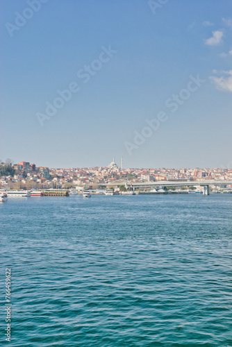 Istanbul / Turkey - 03.23.2024: View of Istanbul Old City from Galata Bridge. Colourful midday business of Istanbul. The Galata Bridge, also known as the Fishermen's Bridge, in Istanbul.