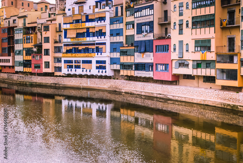 Colorful reflections: The vibrant riverside buildings of Girona