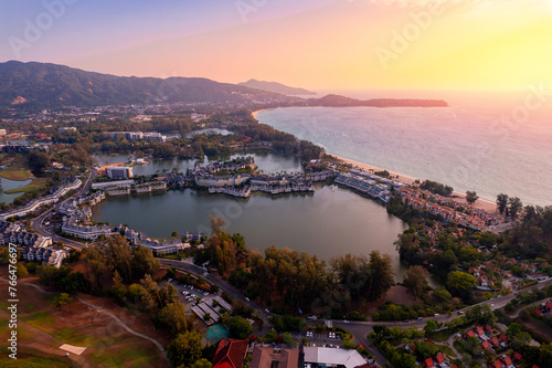 Photography Aerial top view panorama sunset Bang Tao beach with lux hotel of Phuket paradise