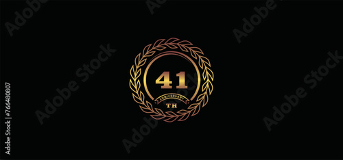 41st anniversary logo with ring and frame, gold color and black background