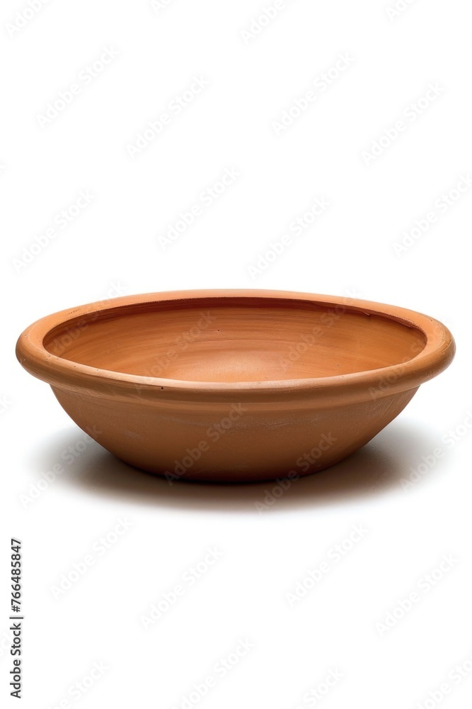 A brown bowl on a white surface, perfect for food photography A brown bowl on a white surface, perfect for food photography