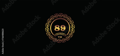 89st anniversary logo with ring and frame, gold color and black background photo