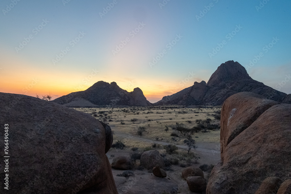 Sunset near Spitzkoppe, a famous granite peak in the center of namibia. Sunset near Spitzkoppe, a famous granite peak in the center of namibia.