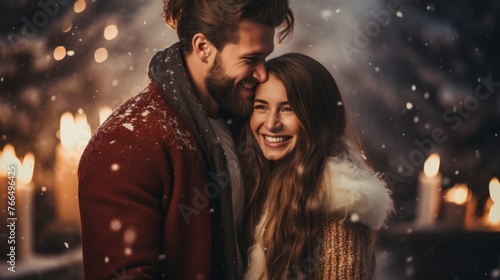 Happy couple enjoying the snow in winter