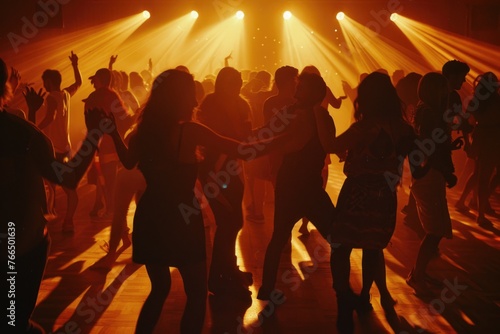 A lively scene of people dancing on a dance floor. Perfect for party and celebration concepts