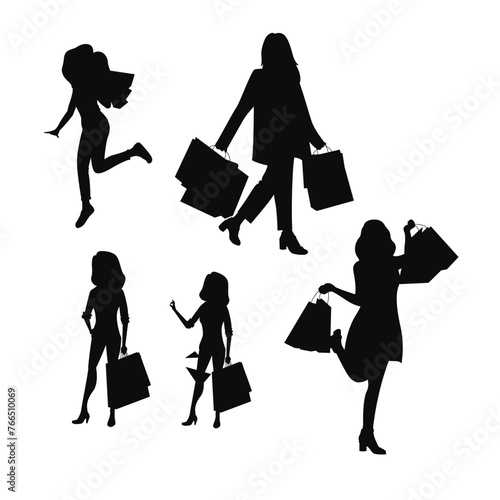 Shopping Woman Holding Bags silhouette on white background