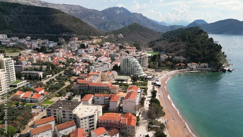 Drone flies over the resort town of Petrovac in Montenegro, Aerial view photo