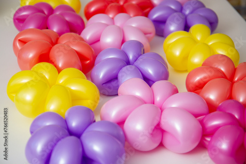 daisies made from balloons on a white background  card made from balloons