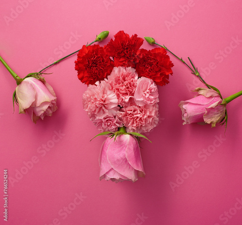 Carnations and roses shaped like woman's uterus