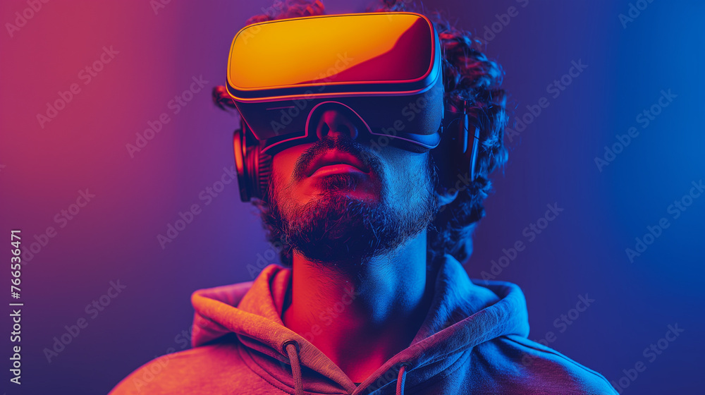 Fototapeta premium Tech-savvy bearded male in casual hoodie, engaged in VR exploration