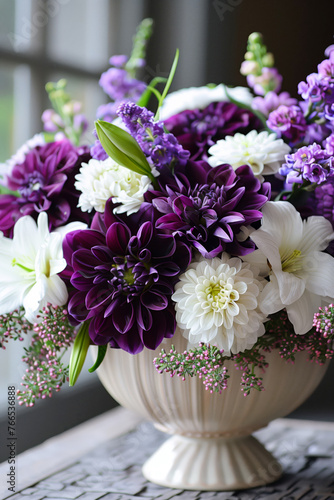 Bouquet of hyacinths, lupines, purple chrysanthemums and white lilies in a white ceramic vase