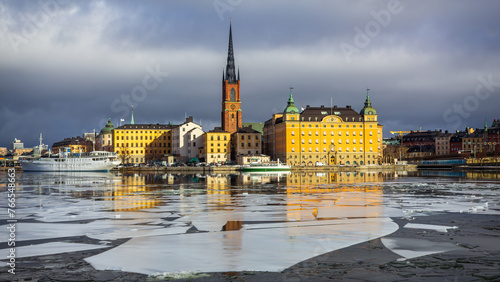 View of Historic Old Town of Stockholm, Sweden over River with Breaking Ice