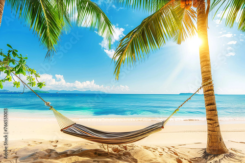 Photo of hammock fixed on palm trees near the shore of the azure sea. Summer vacation concept in tropical places.