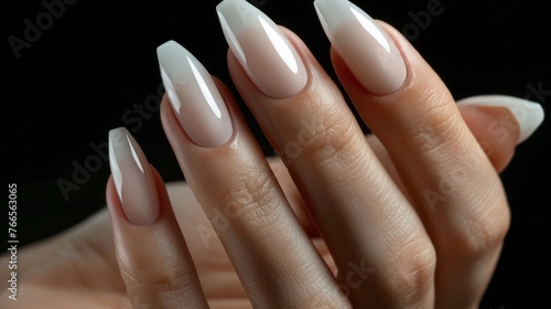 Womans Hand With Pink and White Nail Polish