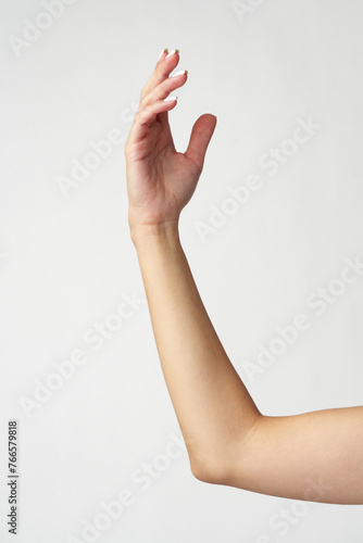 Female hand on white background close up