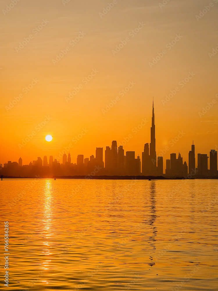 amazing sunset view of Dubai Downtown cityline from Dubai Creek harbour