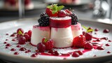 A plate topped with a dessert featuring fresh berries and fluffy whipped cream