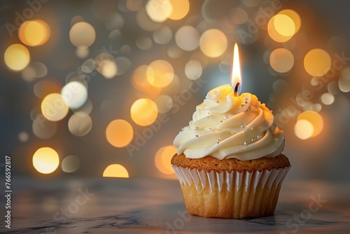 Sweet cupcake with whipped cream and candle on blurred lights background