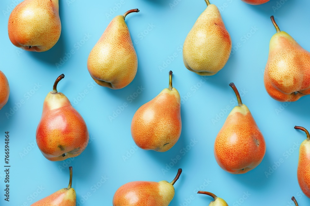 Pattern of ripe pears on blue background Pattern of ripe pears on blue background