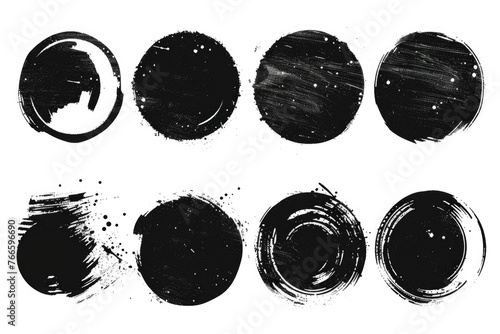 Abstract black ink circles on a clean white background, suitable for graphic design projects