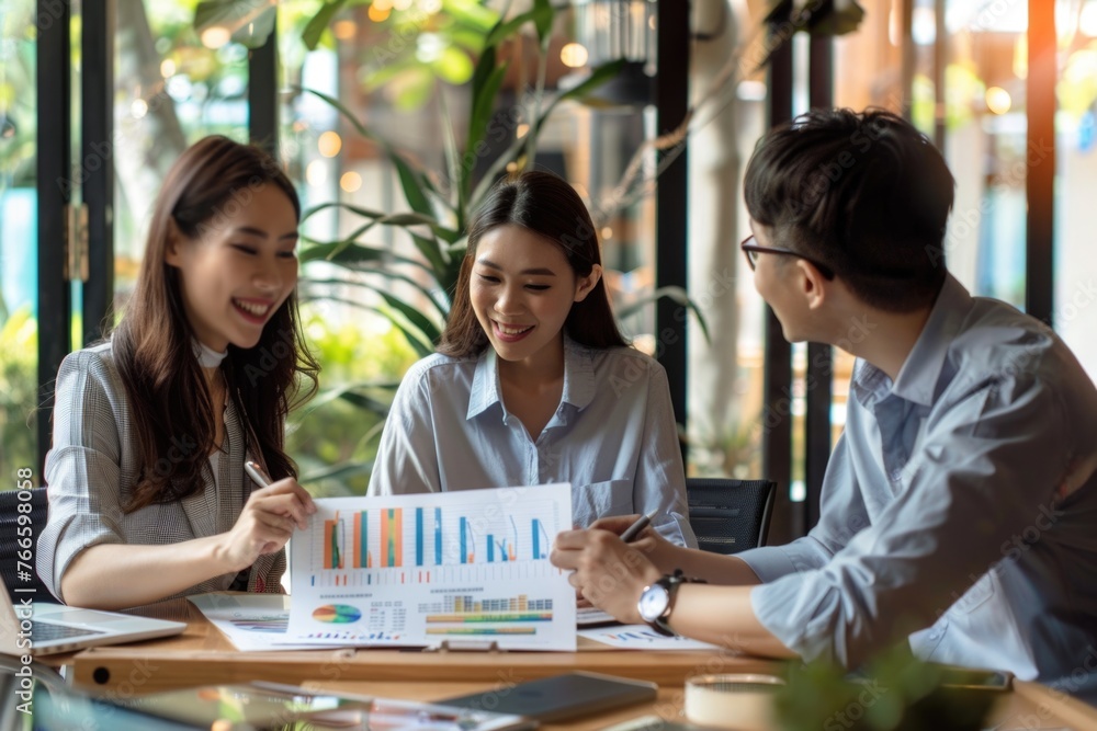 Group of people gathered around a wooden table. Perfect for illustrating teamwork and collaboration Group of people gathered around a wooden table. Perfect for illustrating teamwork and collaboration