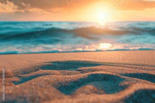 Sand on beach on ocean and sunset sky background