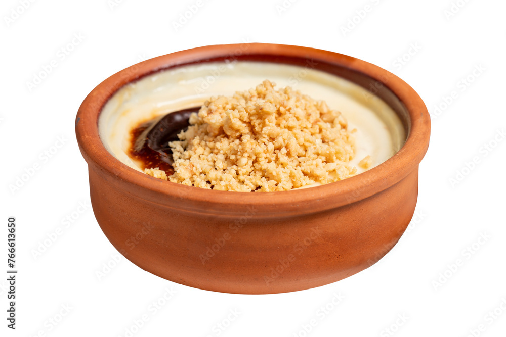 Rice pudding isolated on white background. Milky dessert. Oven-baked rice pudding dessert in a clay bowl. Close up Rice pudding isolated on white background. Milky dessert. Oven-baked rice pudding dessert in a clay bowl. Close up