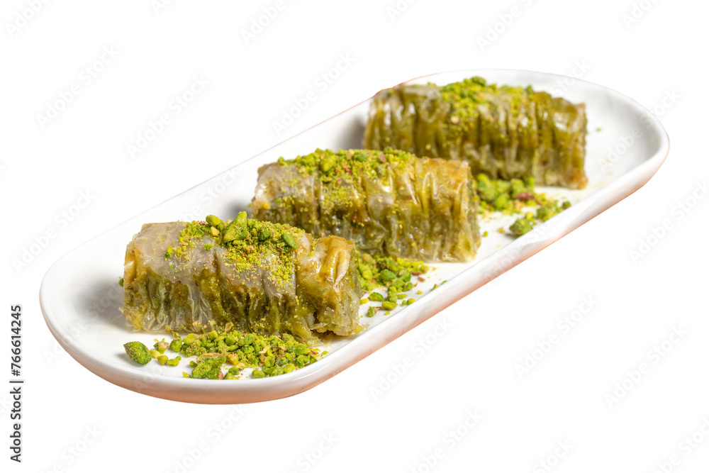 Pistachio baklava isolated on white background. Sherbet dessert. Baklava with pistachios and syrup
