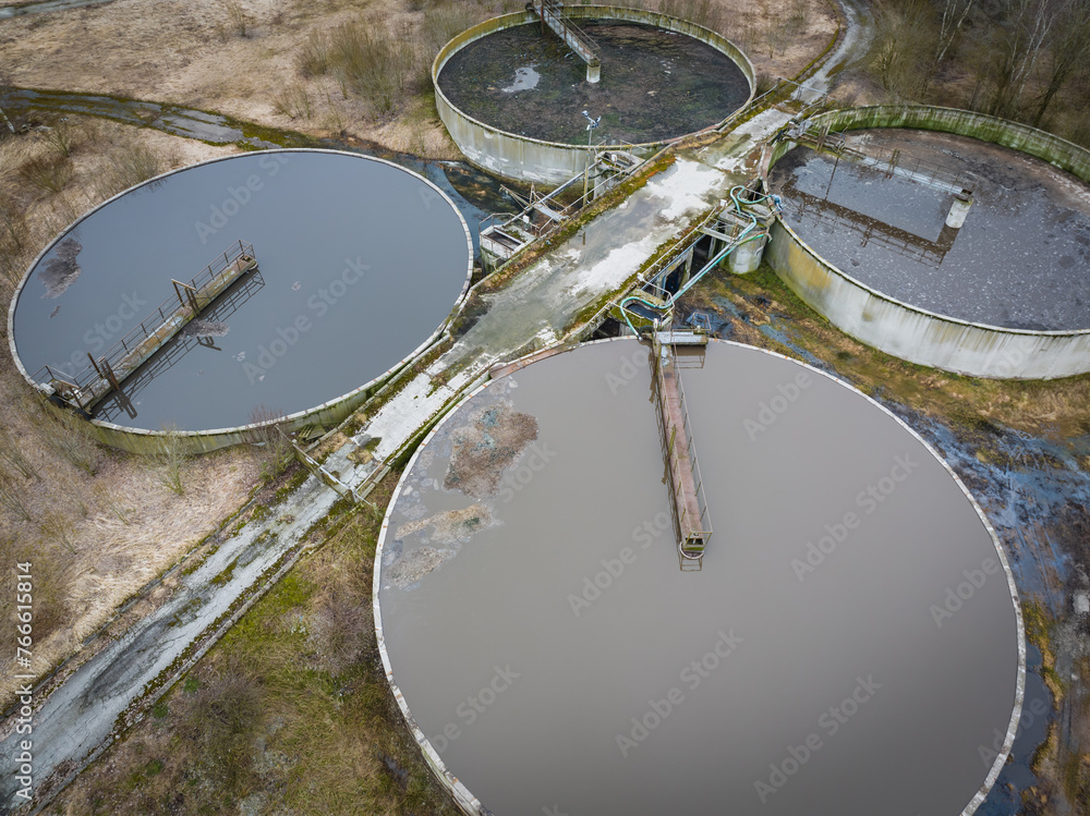 Abandoned water treatment plant, primary settling tanks, drone photo.