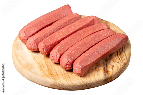 Raw sausage. Butcher products. Sausages made from uncooked beef isolated on white background.  Close up