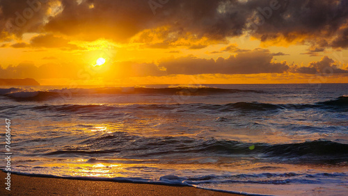 Sunset on the Atlantic ocean beach in Florianopolis, Brazil photo