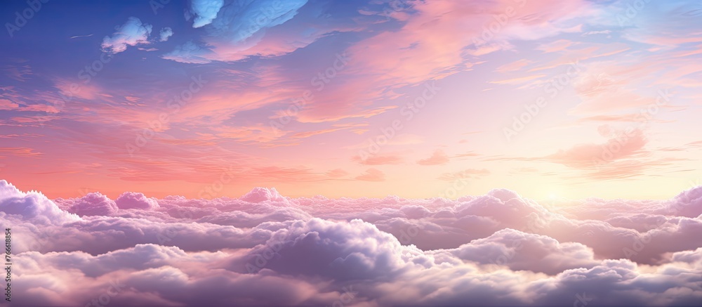 Cloud formations float in the sky, illuminated by a vibrant pink and blue sunset