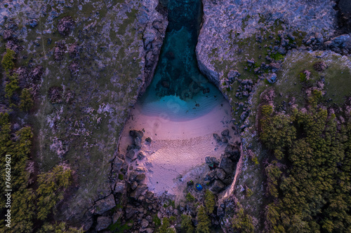 Aerial HDR top view of Anse Bouteille during sunrise in Rodrigues island	