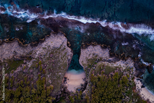 Aerial top view of Anse Bouteille during sunrise in Rodrigues island