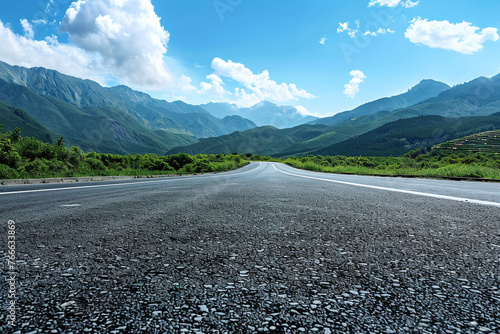 Photo of empty asphalt road against the backdrop of beautiful summer landscape © CozyDigital