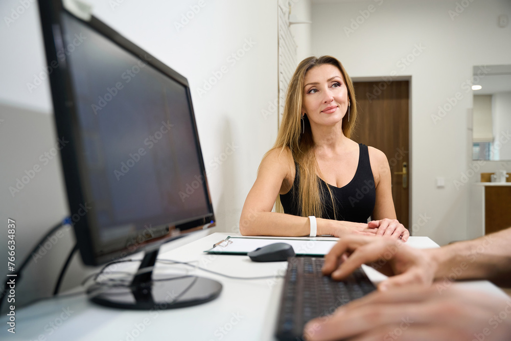 Female patient at a consultation in a rehabilitation center Female patient at a consultation in a rehabilitation center