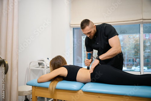 Lady undergoing a physiotherapeutic procedure in a wellness center