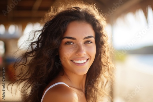 Face portrait of a beauty latina woman at the beach