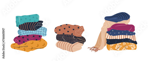 Stack of clean and ironed items of clothing. Set of folded multicolored clothes, apparel and garments, including sweaters, scarf, shirts, blanket. Isolated vector illustrations on a white background.