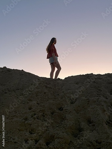 hiker on the top of mountain