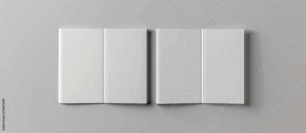 Portrait mock-up paper for magazines, brochures, or posters set against a gray background. Portrait mock-up paper for magazines, brochures, or posters set against a gray background.