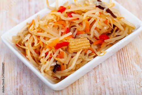 Chinese salad with sprouted mung beans served on plate