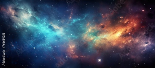 An artistic depiction of a vivid galaxy filled with a myriad of twinkling stars, glowing nebulas, and other cosmic elements in the backdrop photo