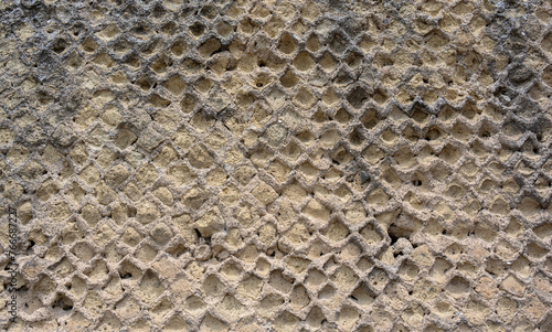  Eroded Roman brick wall in ancient Pompeii, Italy
