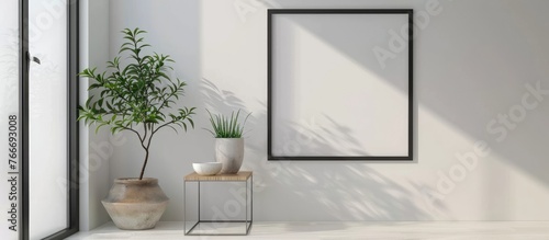 Empty picture frame placeholder on a white wall with an artwork template for interior design.
